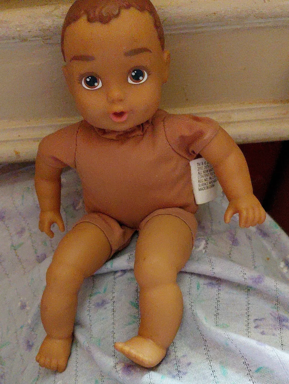 Classic Brown-Clothed Baby Doll - Soft Vinyl Play Doll